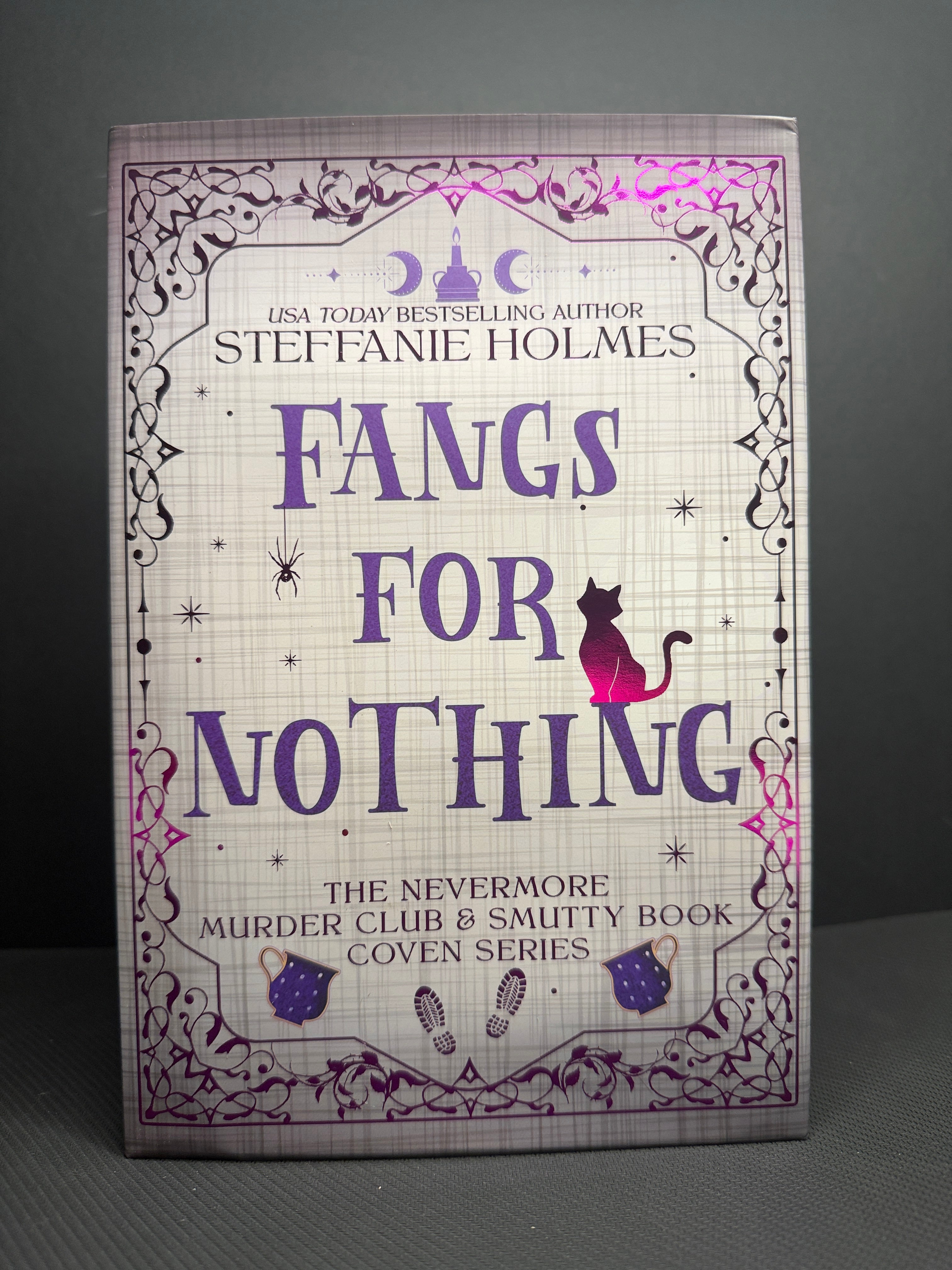 Fangs For Nothing by Steffanie Holmes (White Discreet Hardback)