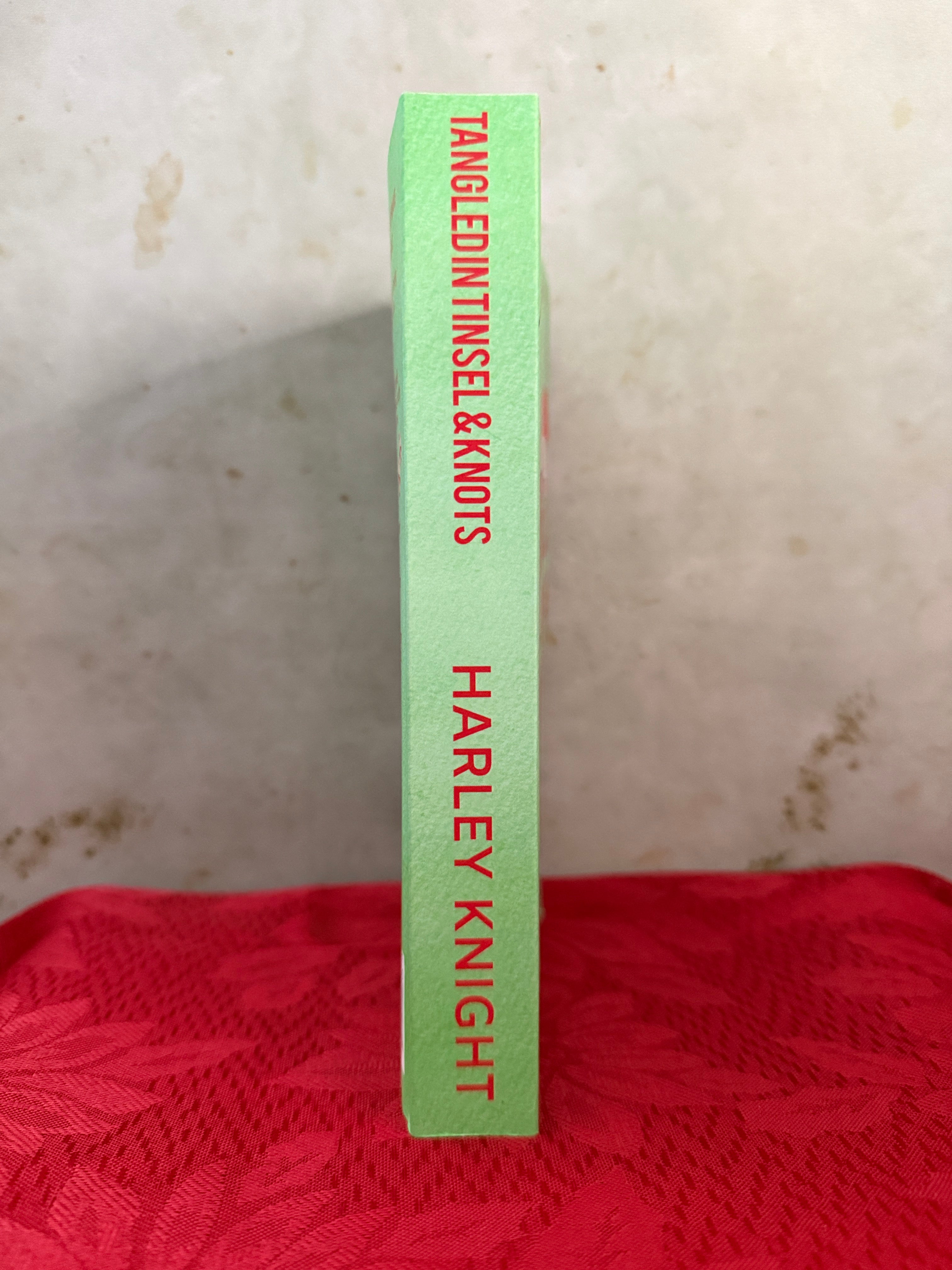Tangled in Tinsel and Knots by Harley Knight