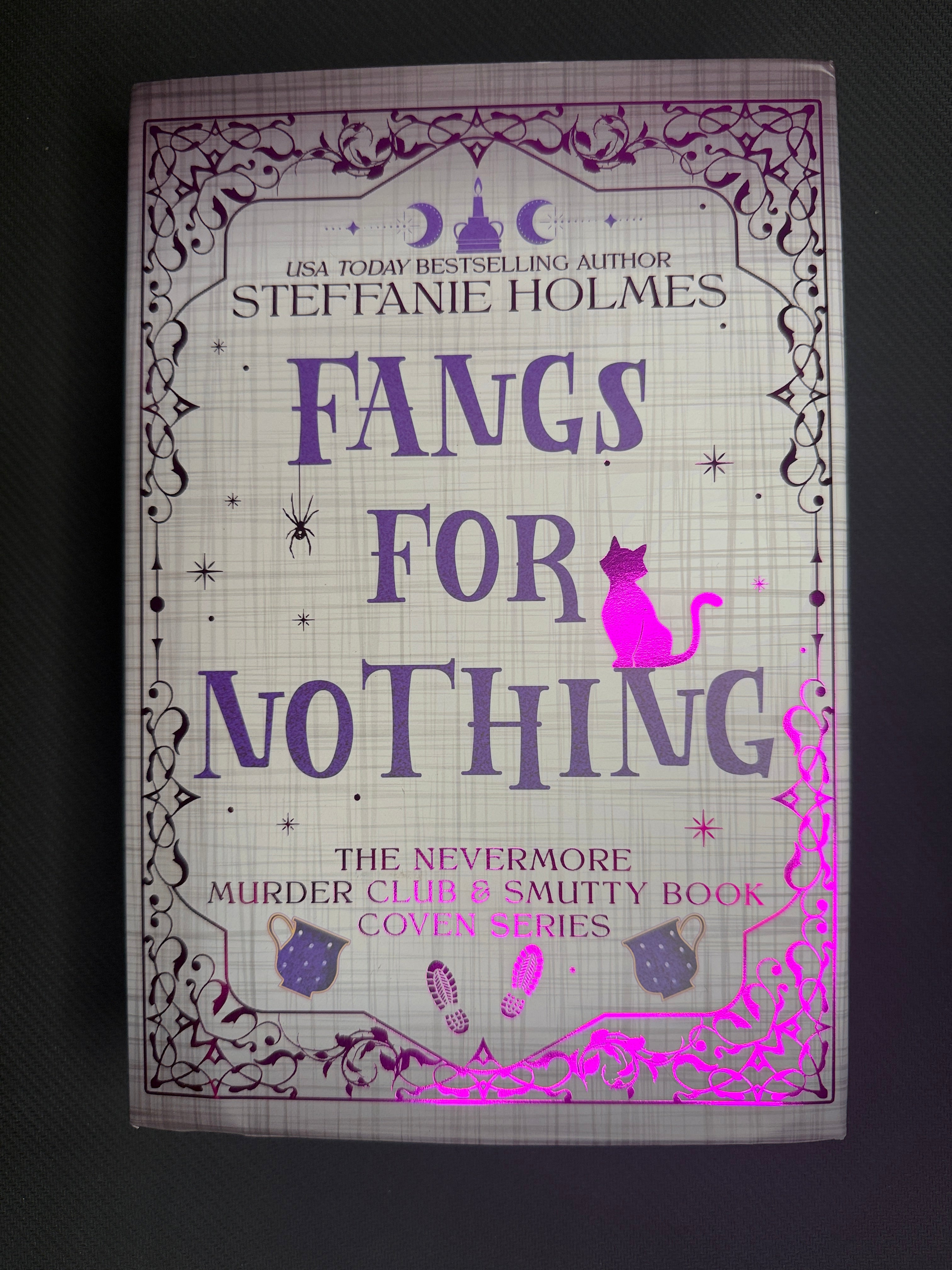 Fangs For Nothing by Steffanie Holmes (White Discreet Hardback)